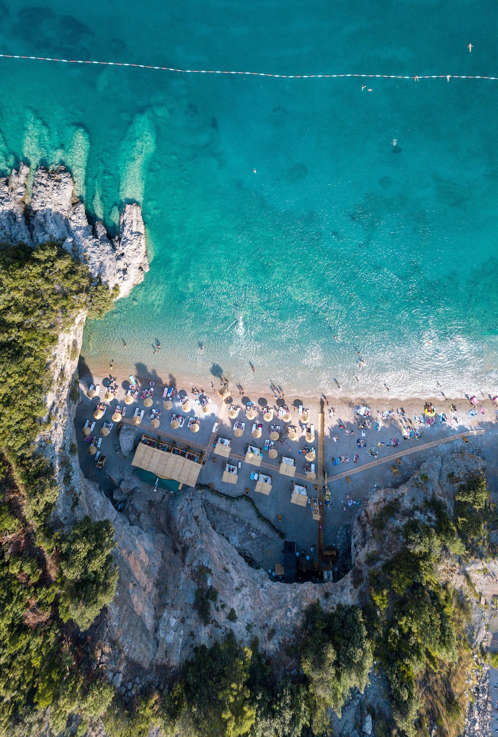 Beach and clear Adriatic water at Luštica Bay