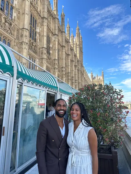 Shaun and Rebekah dressed up outside a historic building